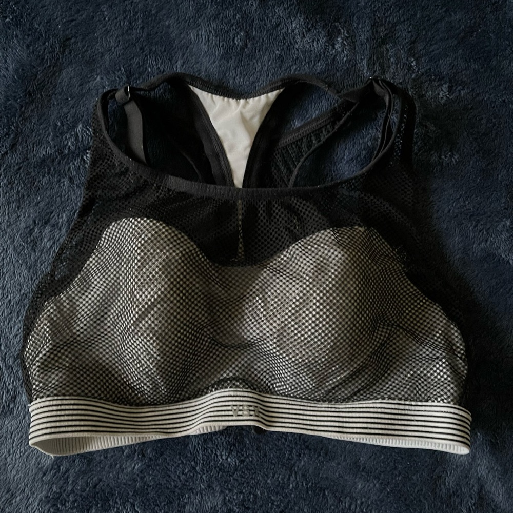 Victoria’s Secret sports bra, 34B, color is white and black